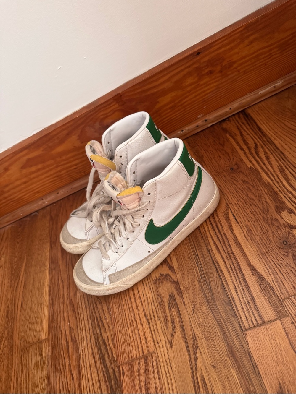 Nike White High-Top Sneakers with Green Swoosh